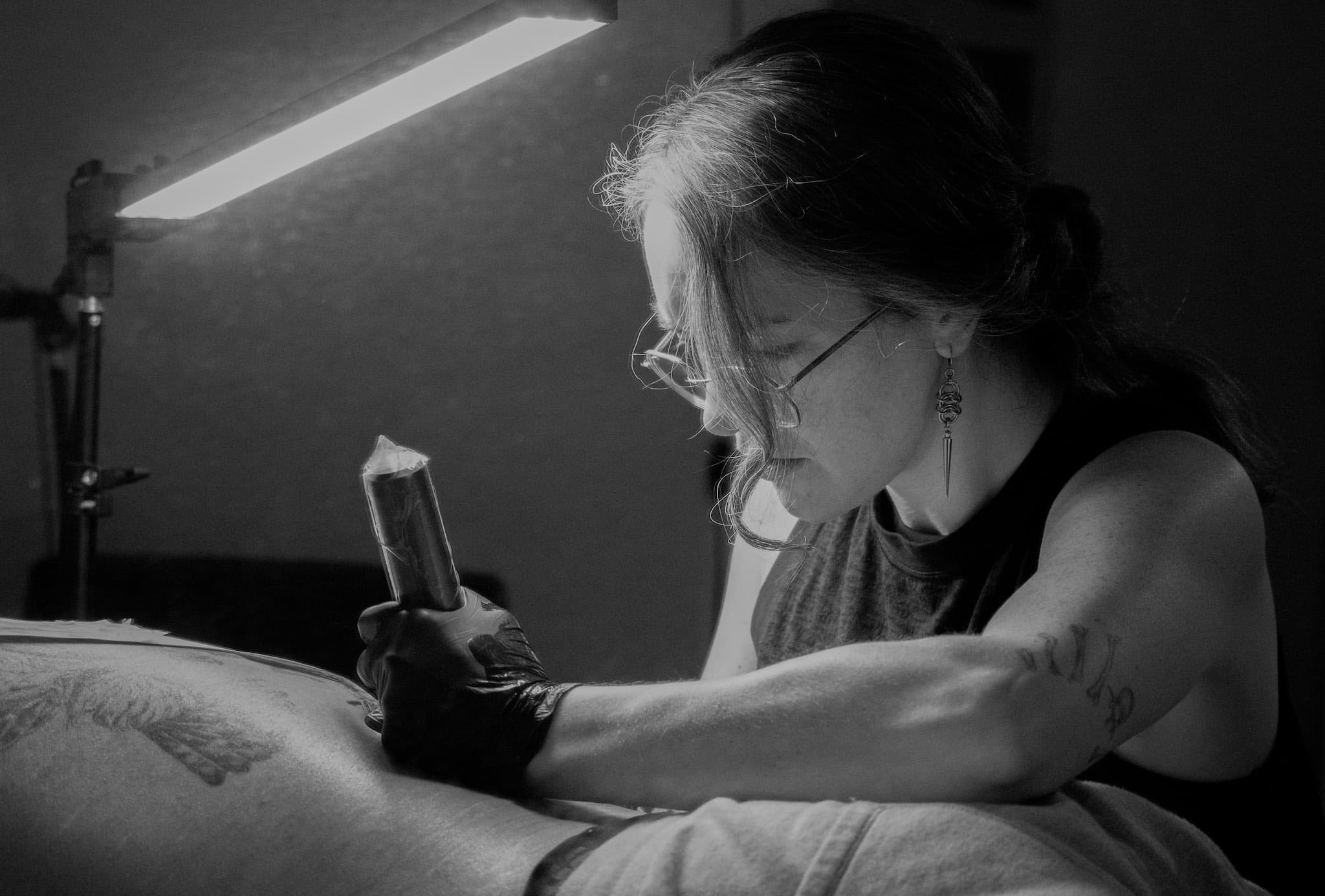 Kait Rogers Tattooing a Client